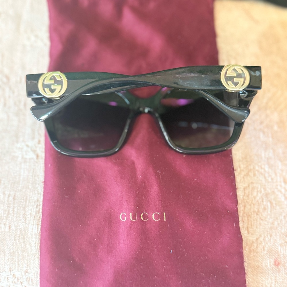 Gucci Black Sunglasses with Silver Temple Accents